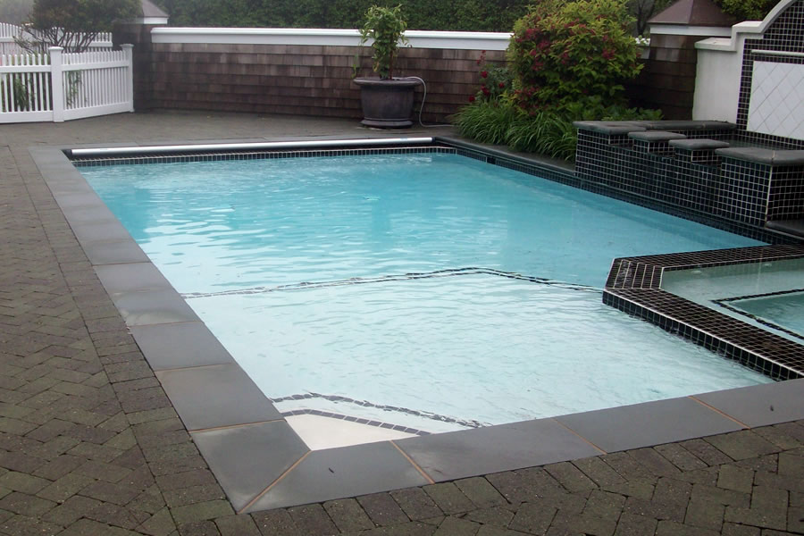  Outdoor Pool and Spa with Water Feature and Pool CoverResidential Pool Design by Omega Pool Structures, Inc